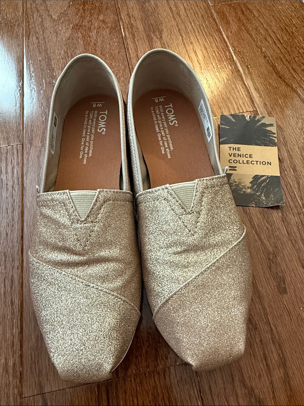 TOMS Venice Collection Women’s Glitter Slip-On Flats in Champagne Gold
